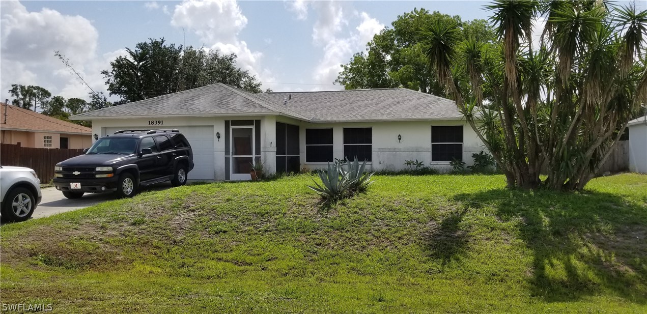 18391 Hawthorne Road Fort Myers, FL 33967 - Photo 1 of 7 a view of a house with backyard