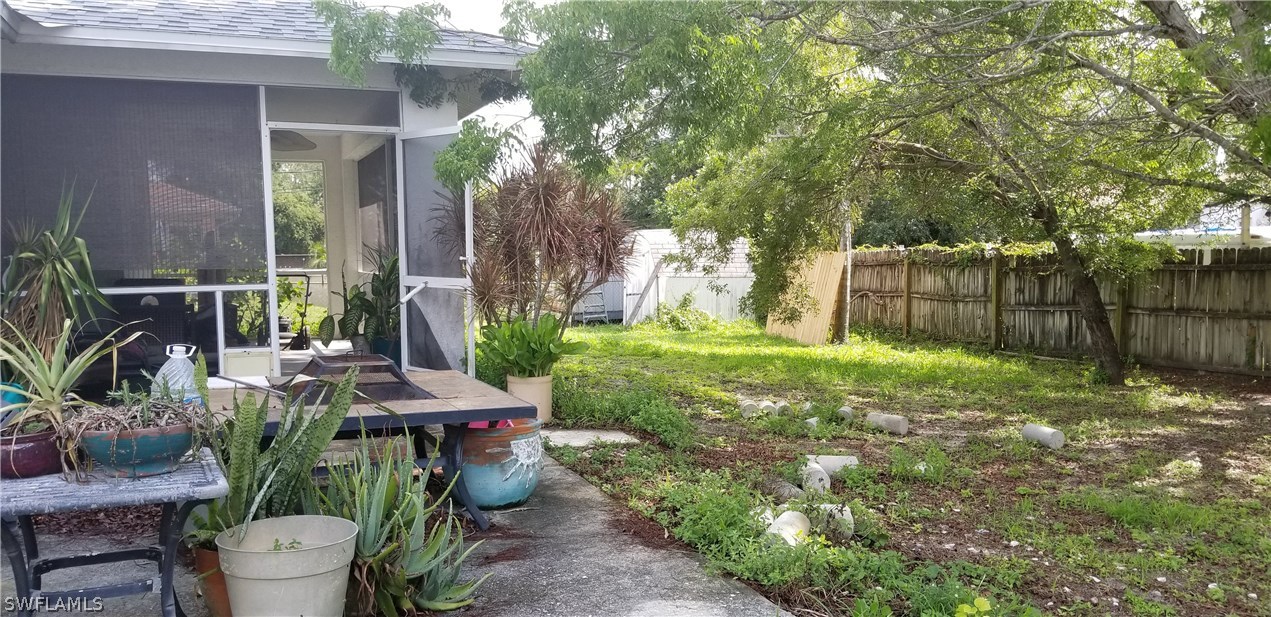 18391 Hawthorne Road Fort Myers, FL 33967 - Photo 2 of 7 a view of yard with patio
