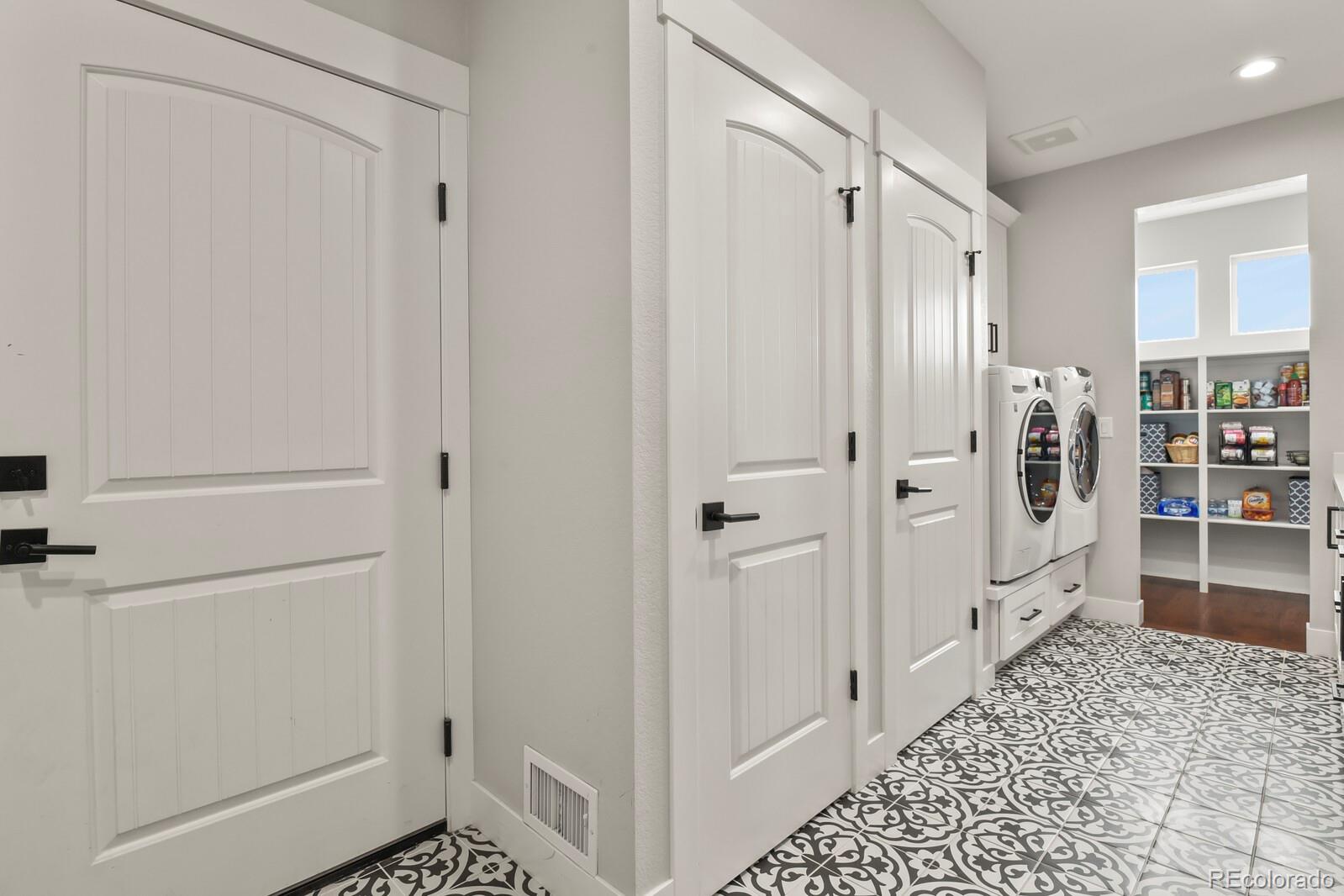 11617 Harpenden Court Fort Lupton, CO 80621 - Photo 19 of 50 a view of a walk in closet