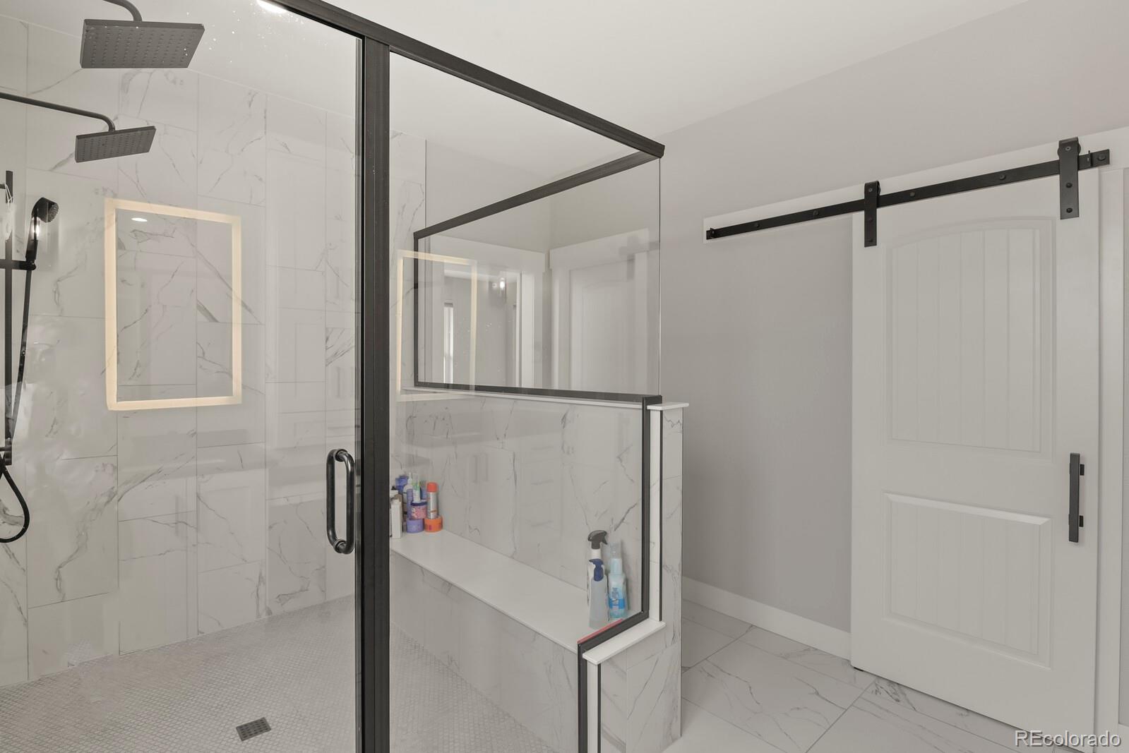 11617 Harpenden Court Fort Lupton, CO 80621 - Photo 25 of 50 a bathroom with a shower