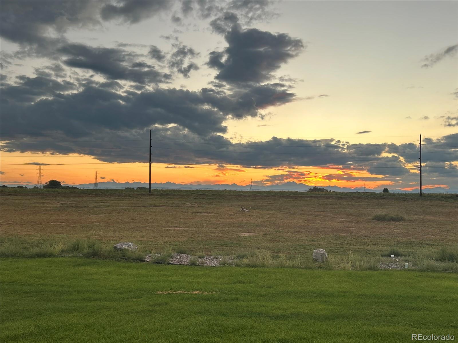 11617 Harpenden Court Fort Lupton, CO 80621 - Photo 38 of 50 a view of an ocean beach