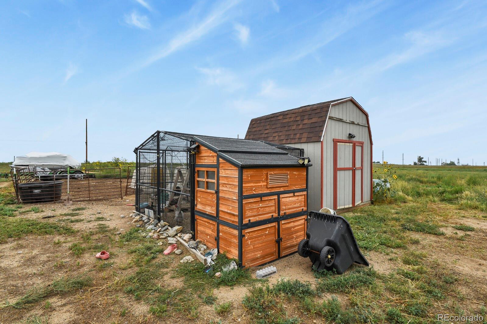 11617 Harpenden Court Fort Lupton, CO 80621 - Photo 39 of 50 a front view of a house with garden