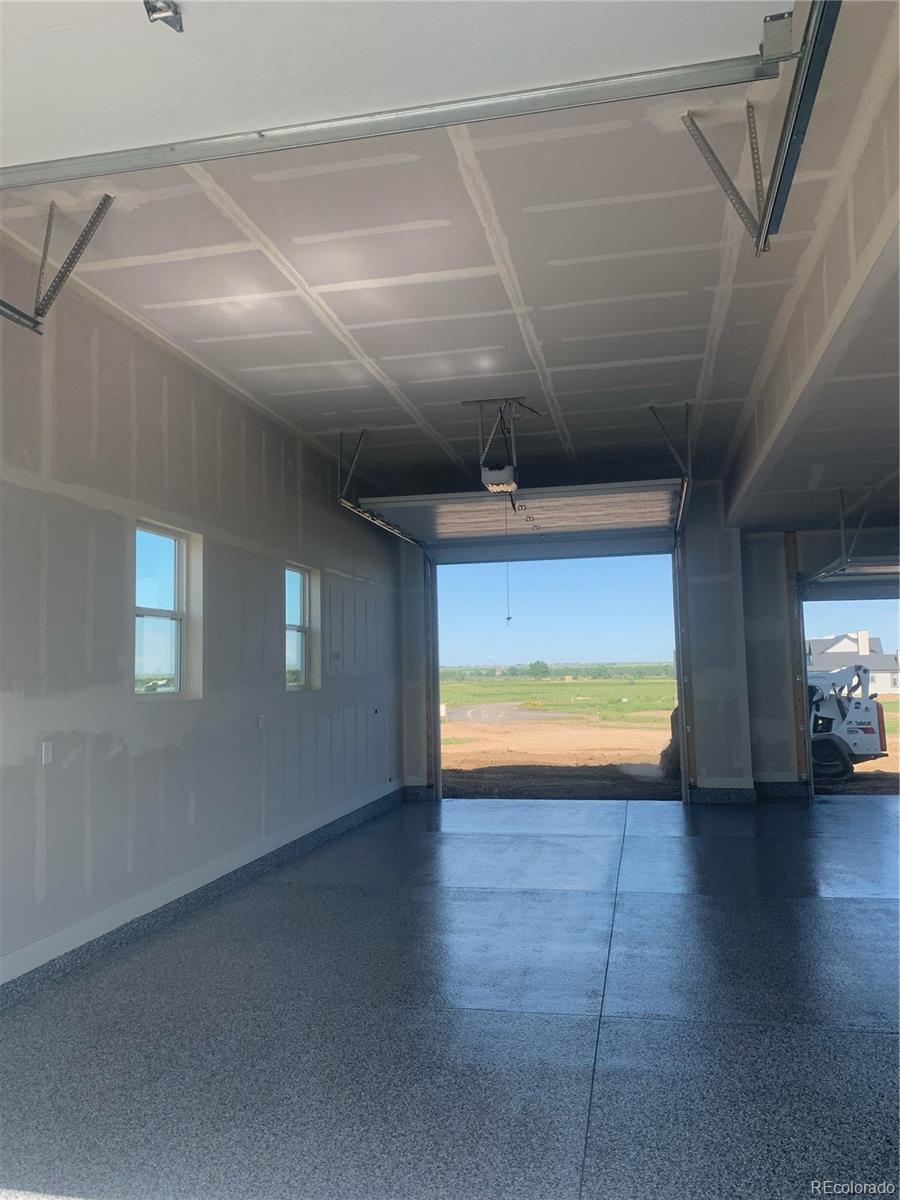 11617 Harpenden Court Fort Lupton, CO 80621 - Photo 47 of 50 a view of an empty room and a window