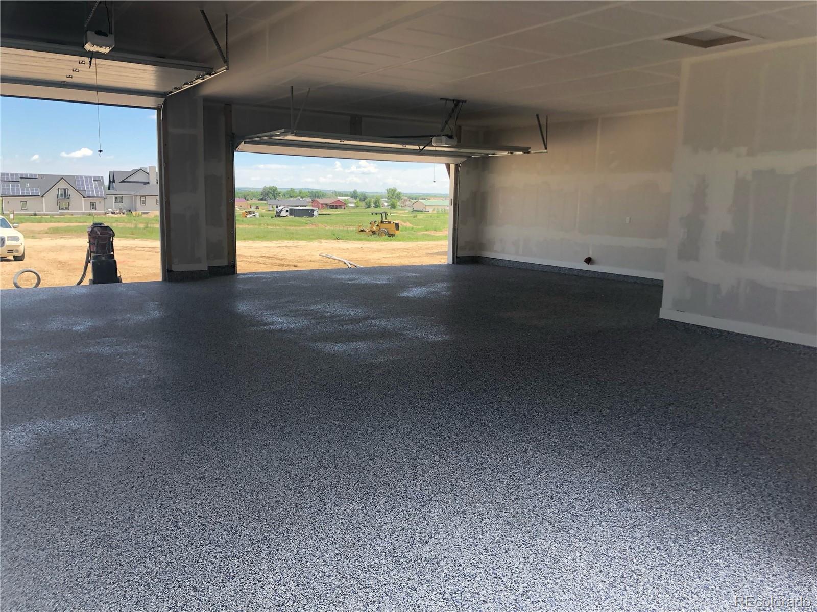 11617 Harpenden Court Fort Lupton, CO 80621 - Photo 48 of 50 a view of an empty room with a window