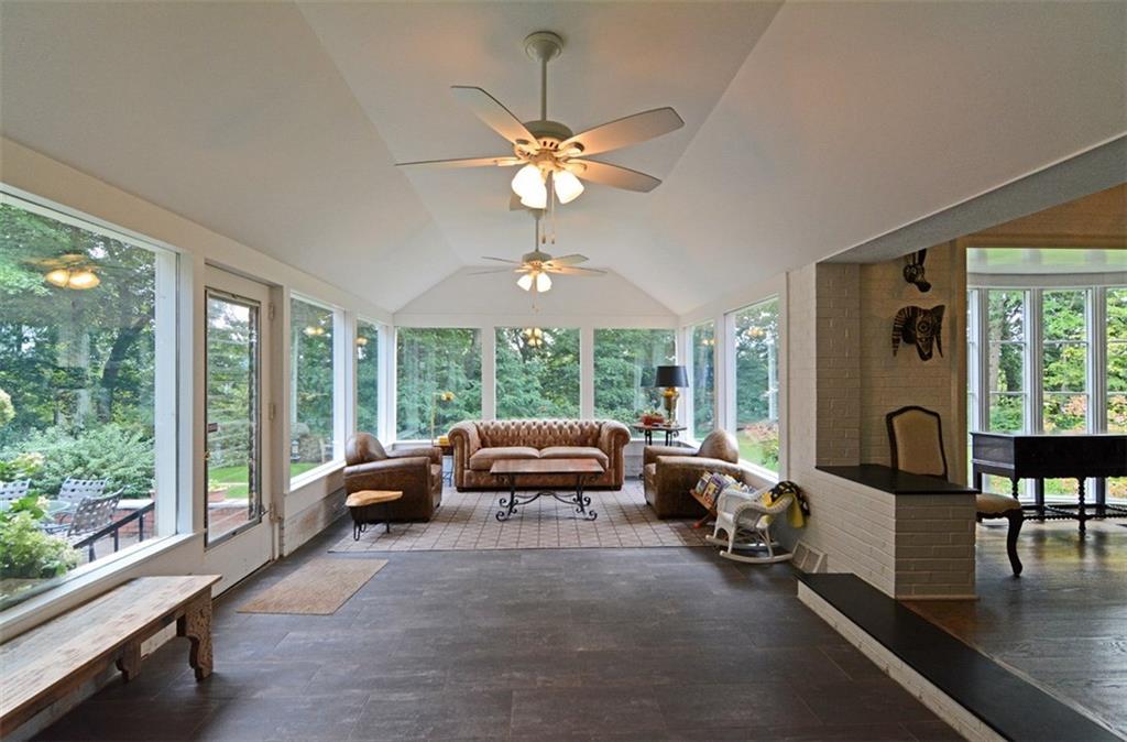 3 Edgewood Road Pittsburgh, PA 15215 - Photo 10 of 18 Large windows frame picturesque wooded views in the expansive family room. Dual ceiling fans add to this room's comfortable environment.