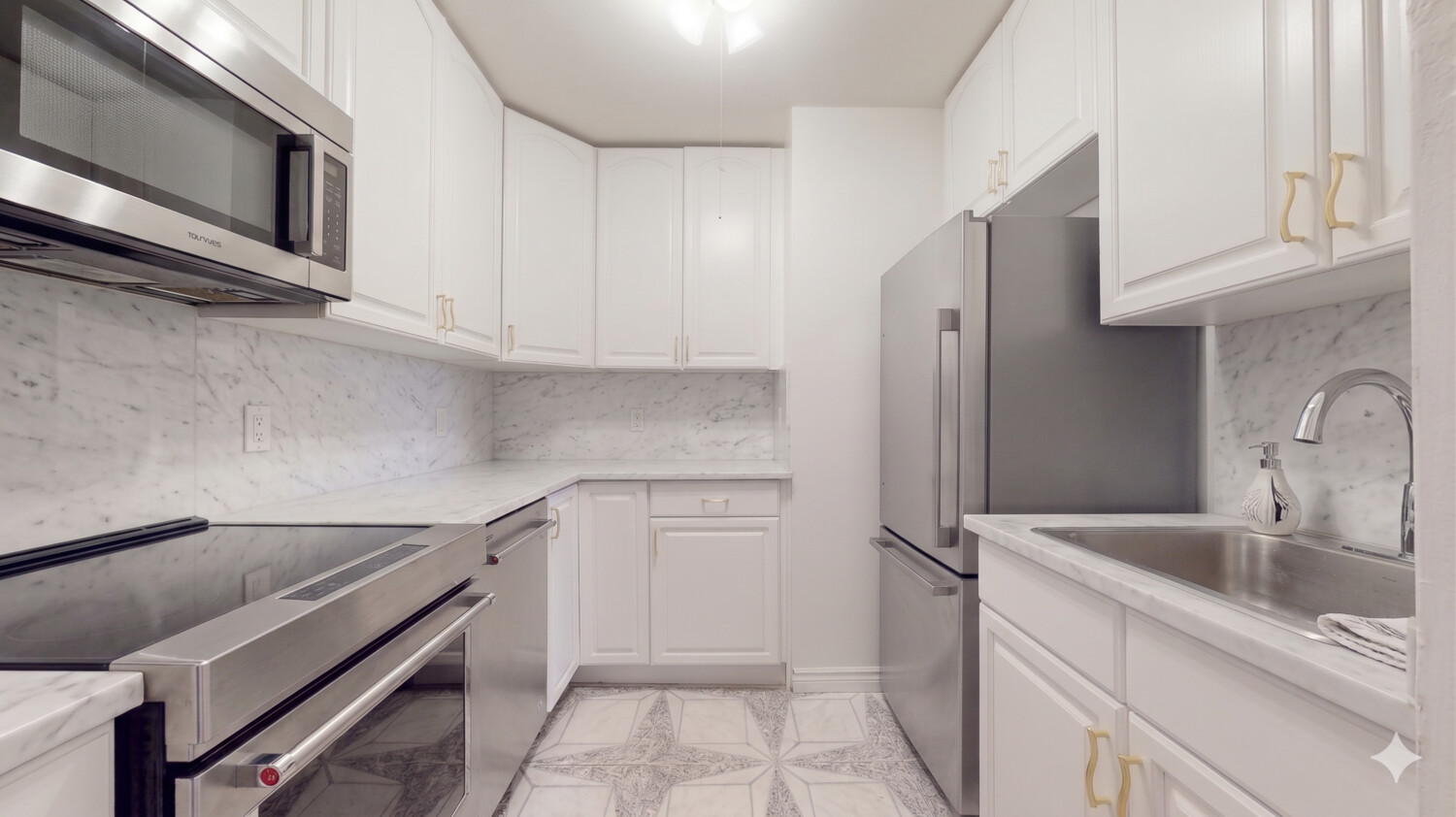 1200 Gravesend Neck Road, Unit 3L Brooklyn, NY 11229 - Photo 8 of 10 a kitchen with a sink and an oven