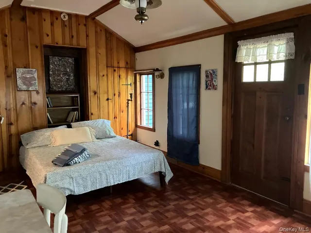 a dining room with a table and chairs