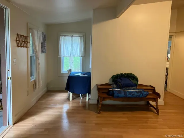 a living room with furniture and a rug