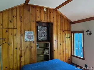 a view of front door with wooden floor
