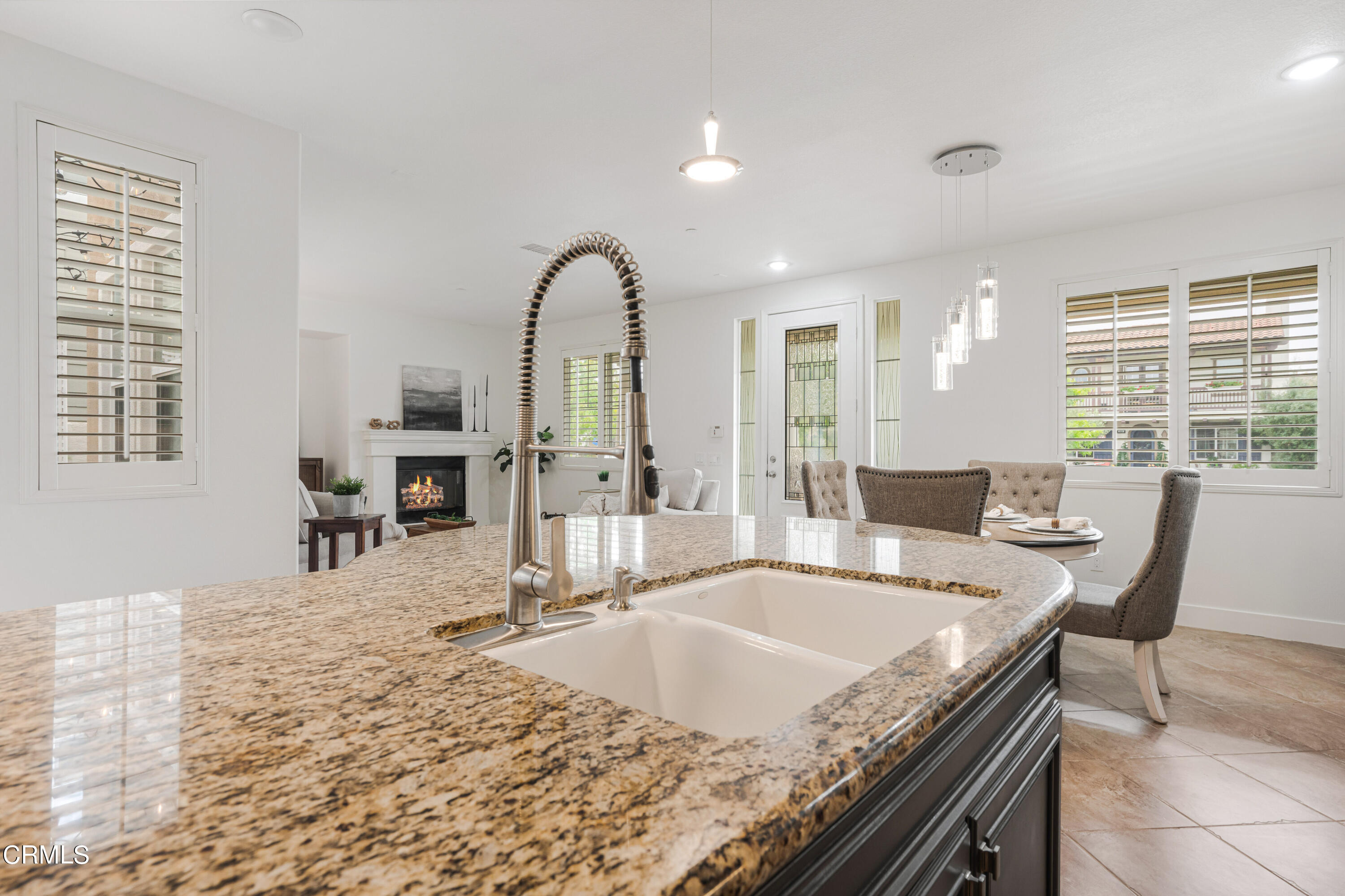 1404 Donegal Way Oxnard, CA 93035 - Photo 14 of 51 a kitchen with a sink and living room