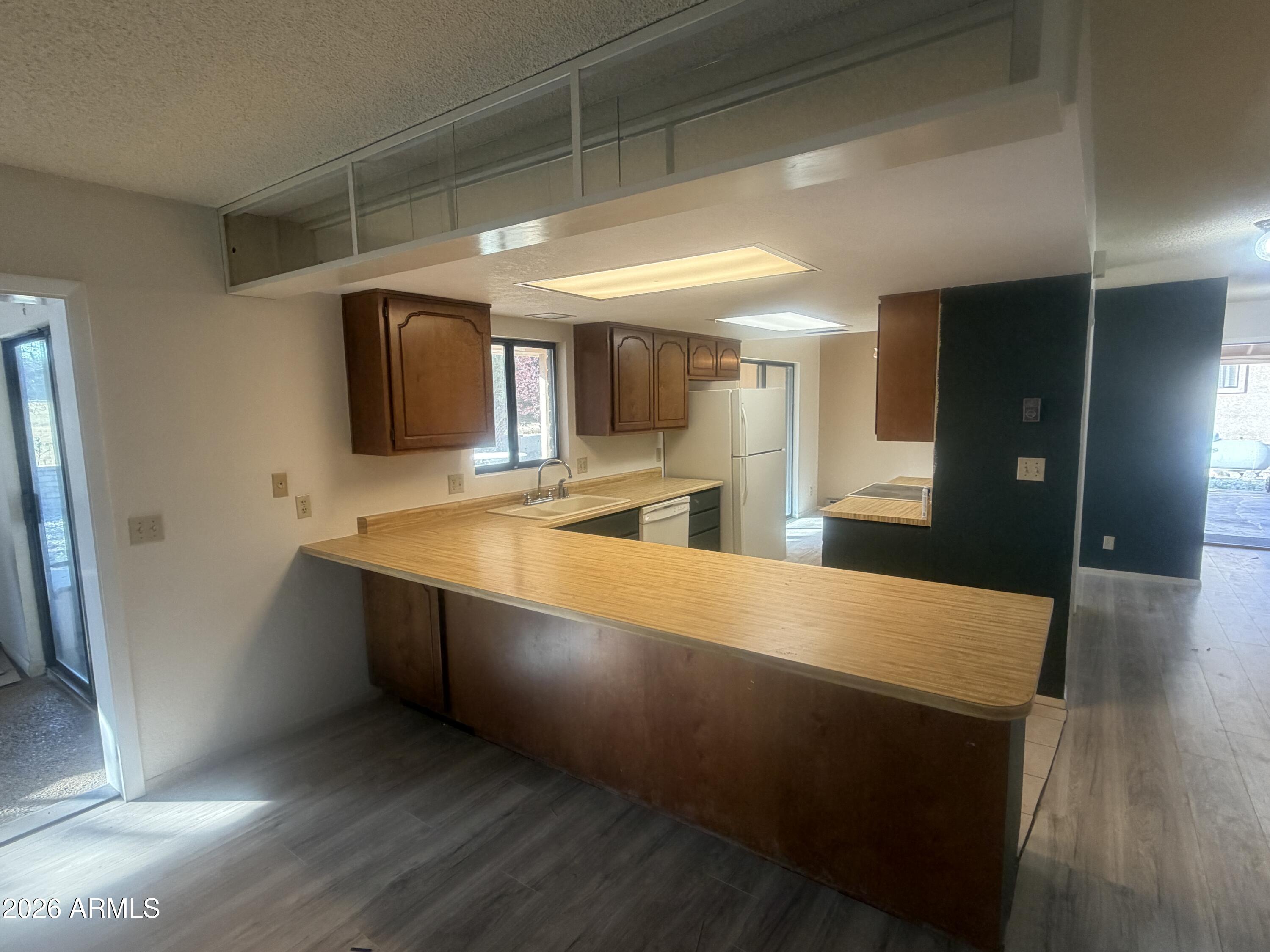3255 East Rimrock Drive Rimrock, AZ 86335 - Photo 6 of 18 a large kitchen with stainless steel appliances a large counter top