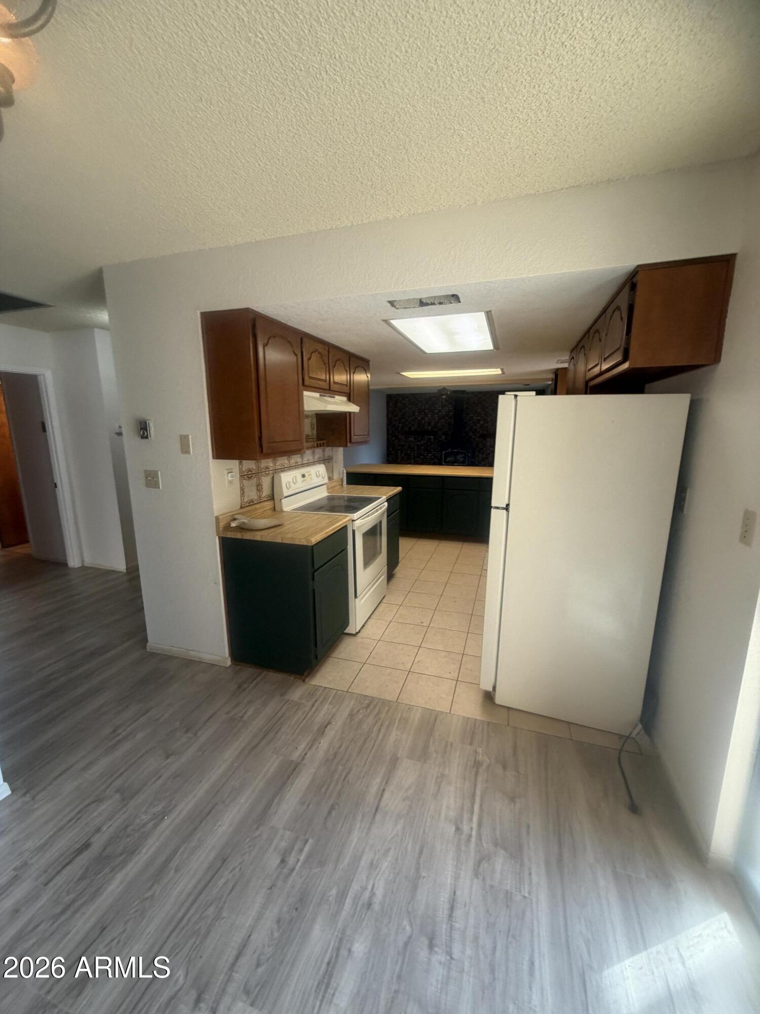3255 East Rimrock Drive Rimrock, AZ 86335 - Photo 7 of 18 a kitchen with stainless steel appliances a stove a refrigerator and a oven