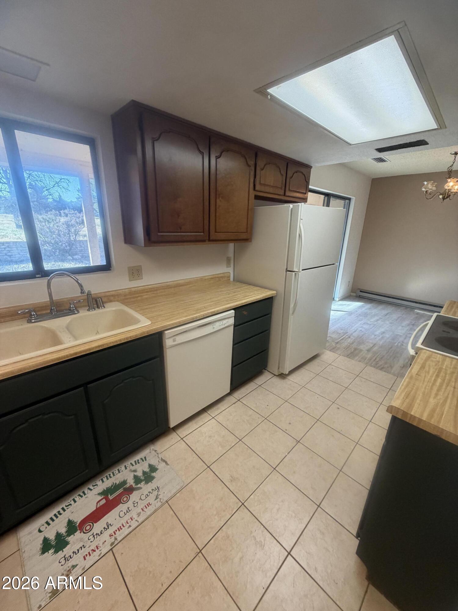 3255 East Rimrock Drive Rimrock, AZ 86335 - Photo 8 of 18 a kitchen with a sink cabinets and stainless steel appliances