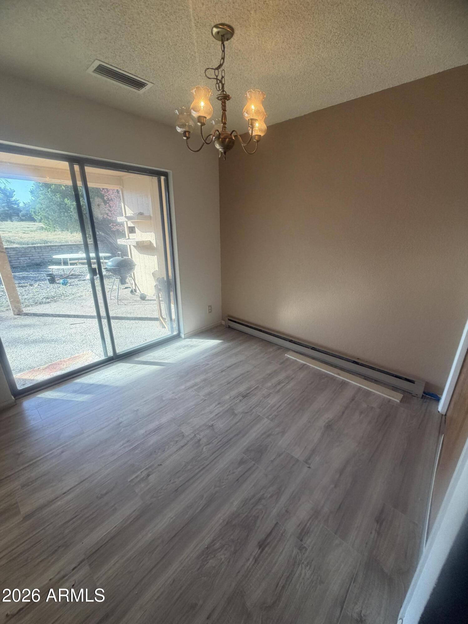 3255 East Rimrock Drive Rimrock, AZ 86335 - Photo 10 of 18 a view of an empty room with a window