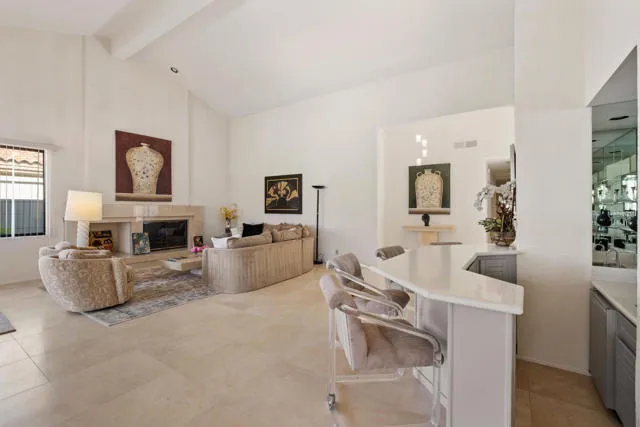 a view of a dining room with furniture and window