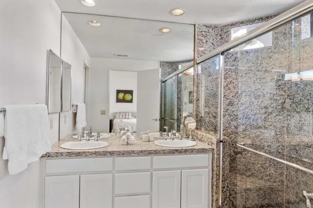 a utility room with sink dryer and washer