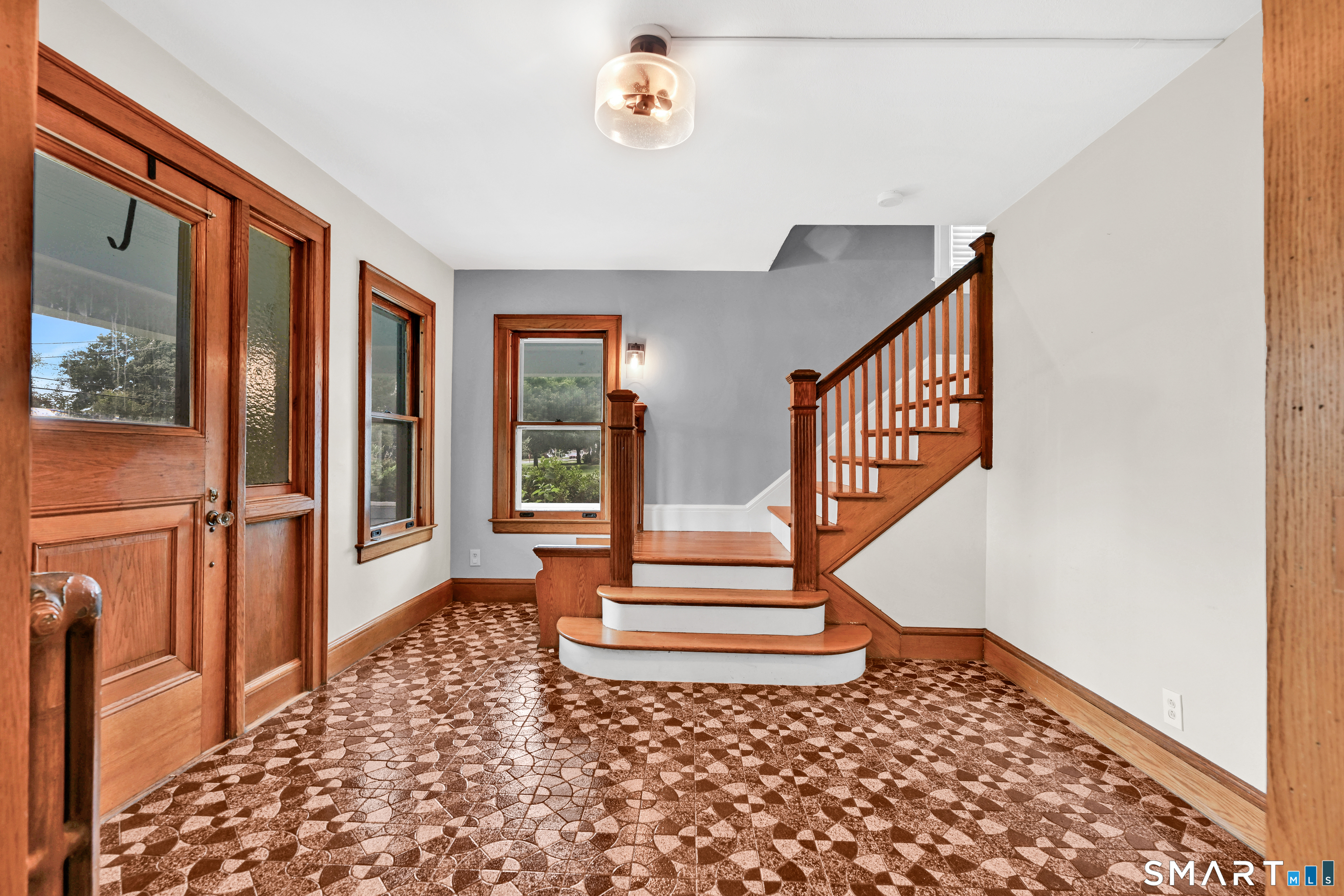 295 Wolcott Hill Road Wethersfield, CT 06109 - Photo 3 of 40 Stairs lead to 4 bedrooms and one bathroom (other 1 bed and 1 bath have separate entrance)
