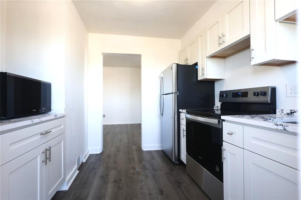 2811 Brownsville Road, Unit 4 Brentwood, PA 15227 - Photo 4 of 14 a kitchen with cabinets and steel appliances