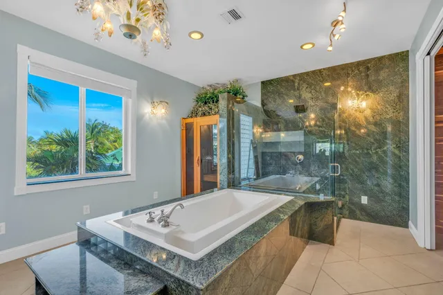 a utility room with sink dryer and washer
