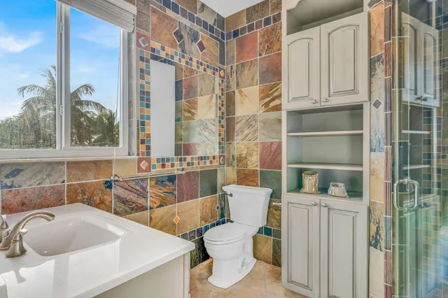 front view of a house with a swimming pool