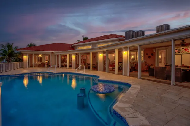 a view of a flower in front of a house