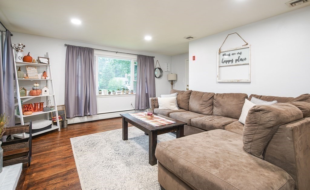 148 Glenoak Drive Springfield, MA 01129 - Photo 12 of 28 a living room with furniture and a window