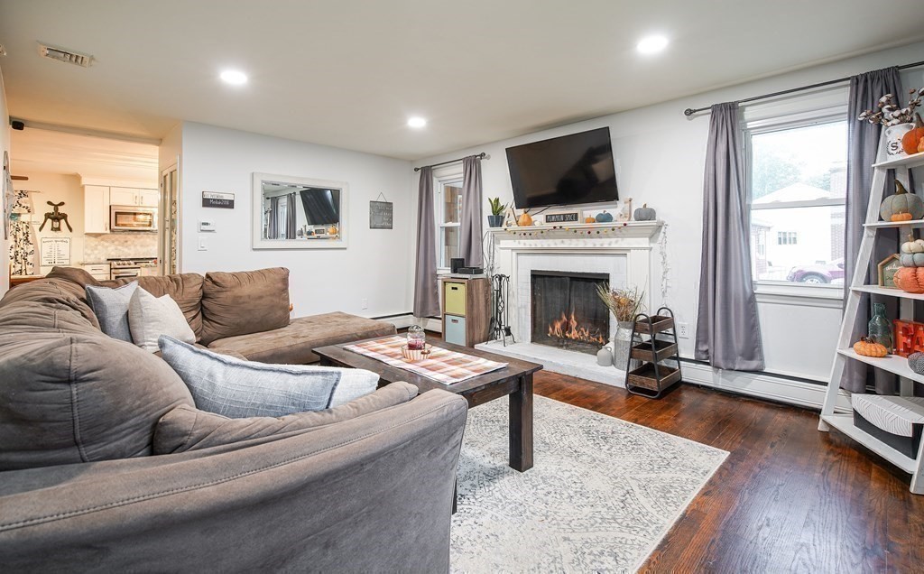 148 Glenoak Drive Springfield, MA 01129 - Photo 13 of 28 a living room with furniture fireplace and flat screen tv