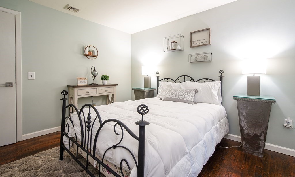 148 Glenoak Drive Springfield, MA 01129 - Photo 15 of 28 a bedroom with bed and a table