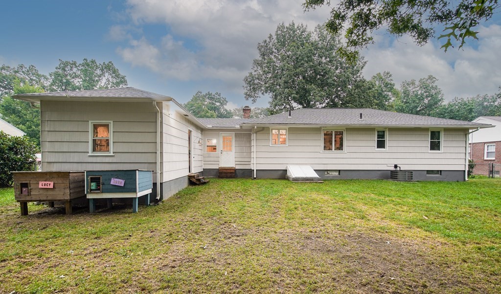 148 Glenoak Drive Springfield, MA 01129 - Photo 26 of 28 a front view of a house with garden