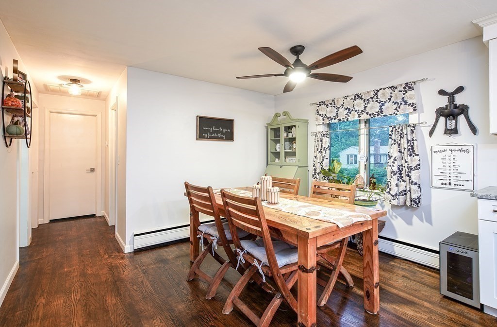 148 Glenoak Drive Springfield, MA 01129 - Photo 10 of 28 a view of a dining room with furniture window and wooden floor
