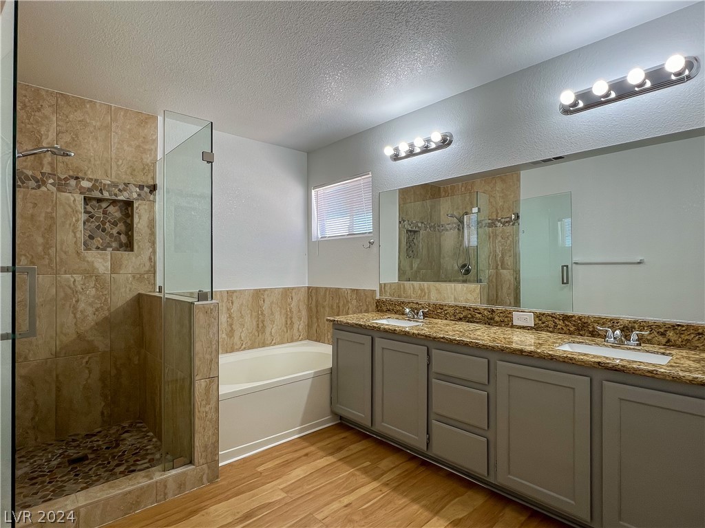 8325 Maplestar Road Las Vegas, NV 89128 - Photo 19 of 24 Dual sinks, separate tub and larger shower with gl
