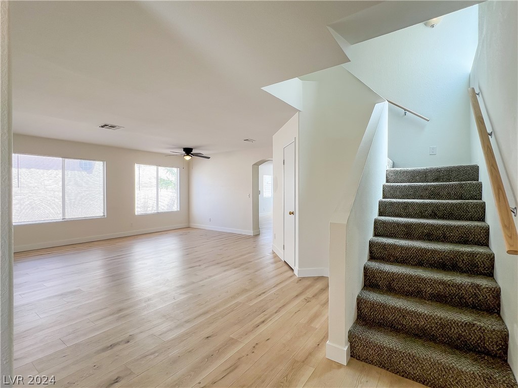8325 Maplestar Road Las Vegas, NV 89128 - Photo 3 of 24 New laminte floors all lower level