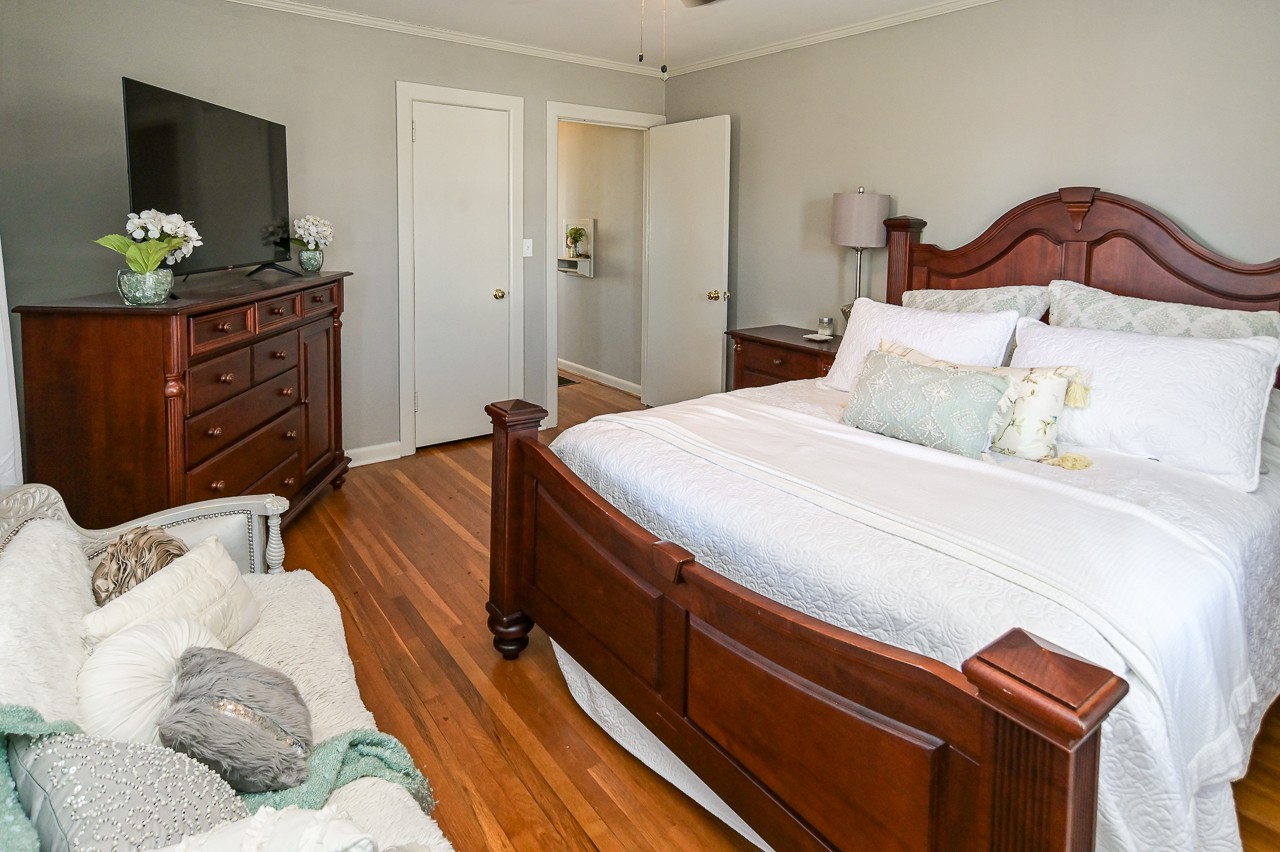 801 2nd Avenue Fayetteville, TN 37334 - Photo 18 of 41 a bedroom with a bed and lamps