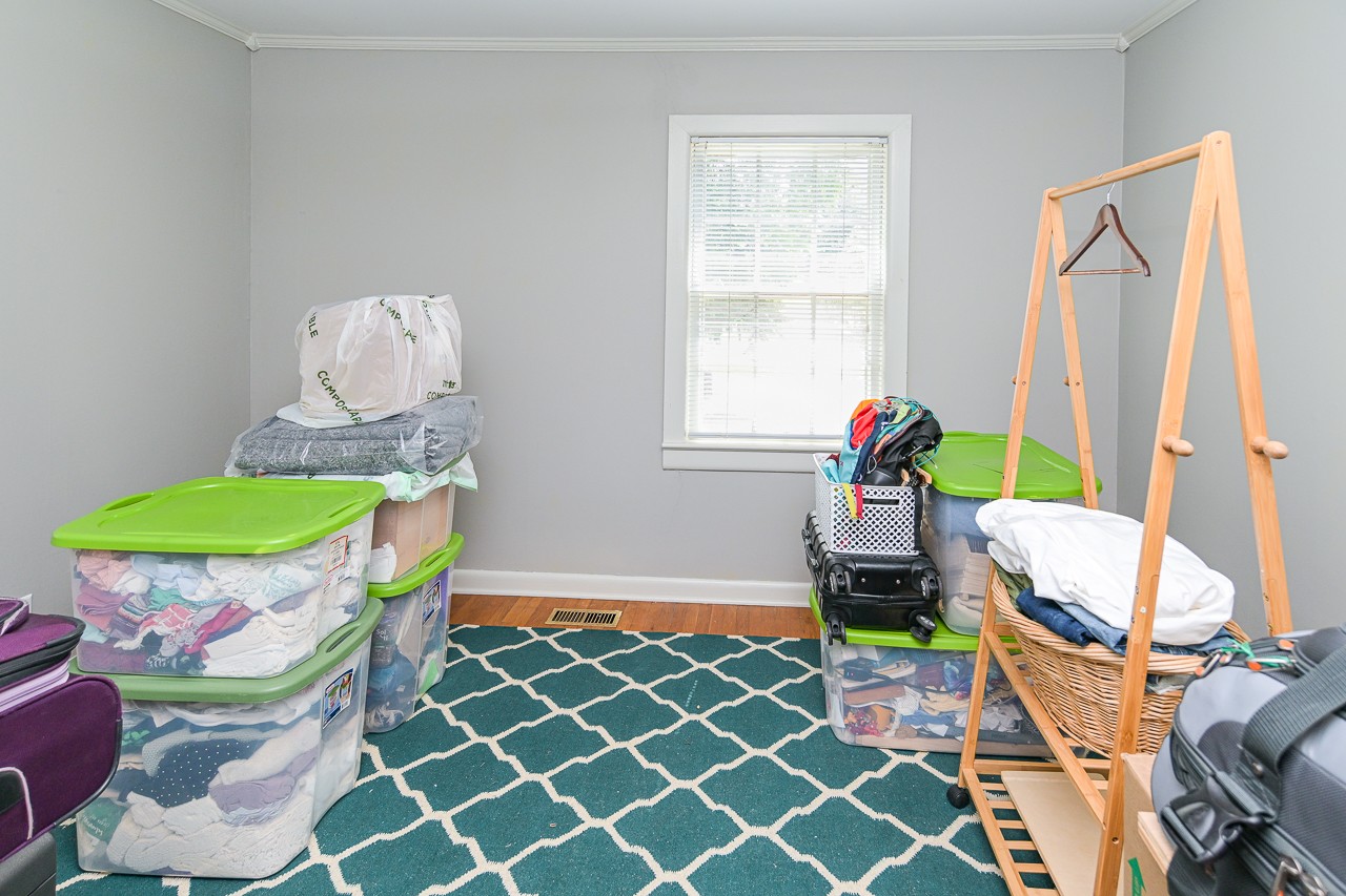 801 2nd Avenue Fayetteville, TN 37334 - Photo 21 of 41 a dining room with furniture a rug and a window