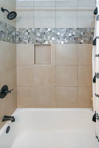 a bathroom with a bathtub