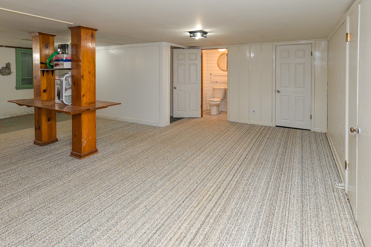 801 2nd Avenue Fayetteville, TN 37334 - Photo 26 of 41 an empty room with wooden floor and windows