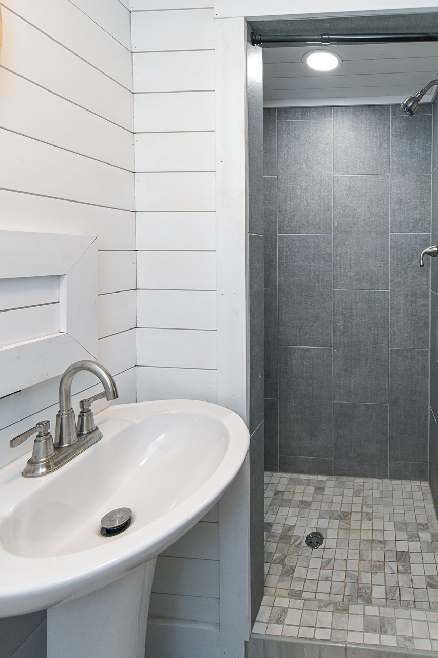 801 2nd Avenue Fayetteville, TN 37334 - Photo 30 of 41 a bathroom with a sink and a shower