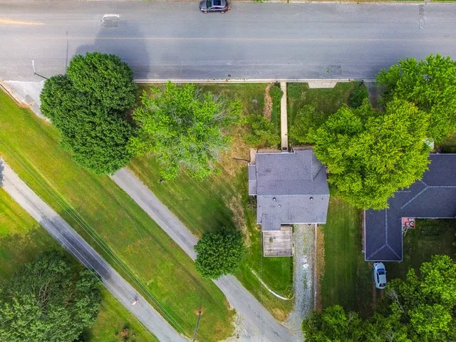 a view of a garden from a balcony