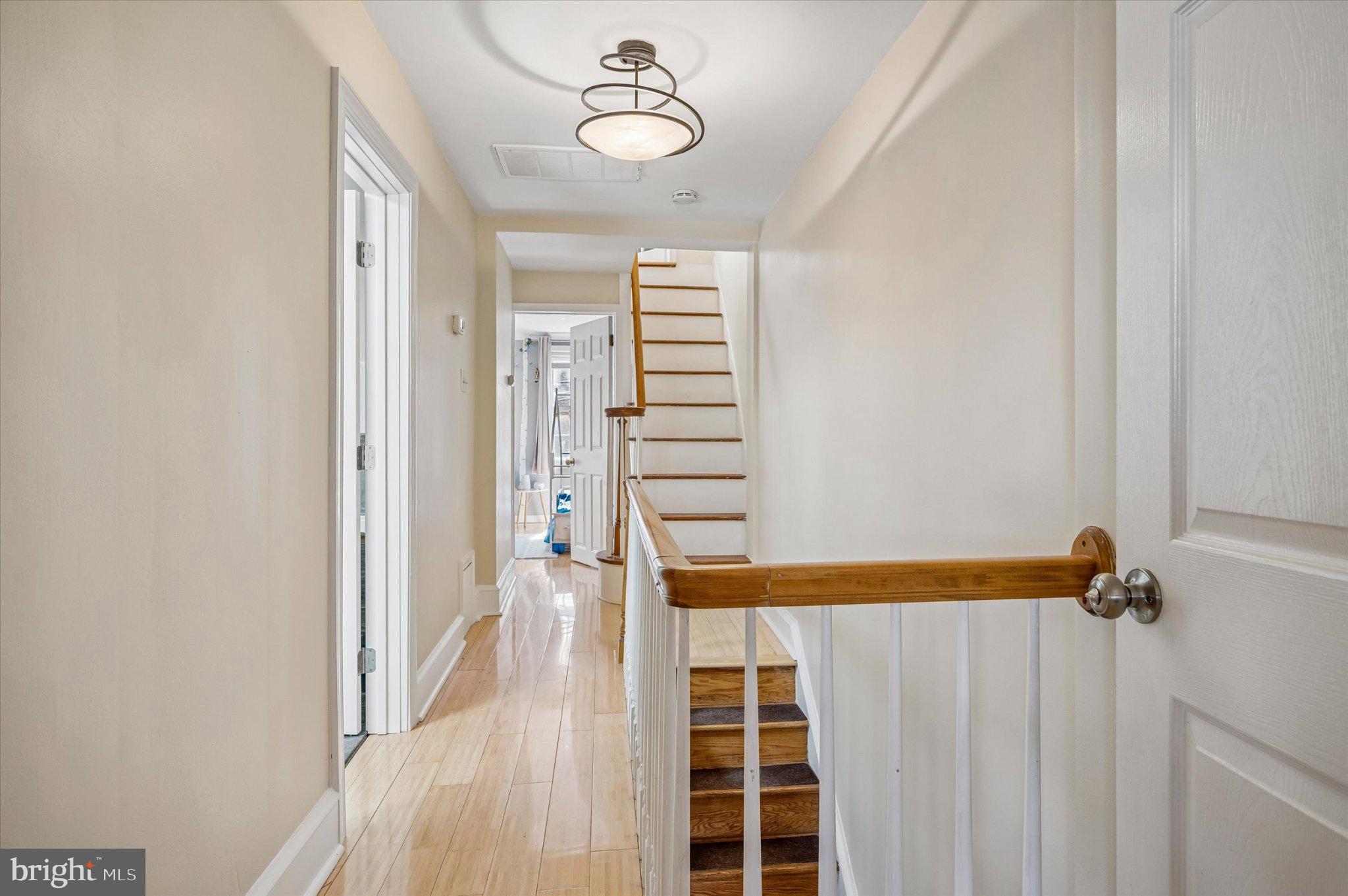 2834 Edgemont Street Philadelphia, PA 19134 - Photo 18 of 37 a view of a room with wooden floor and windows