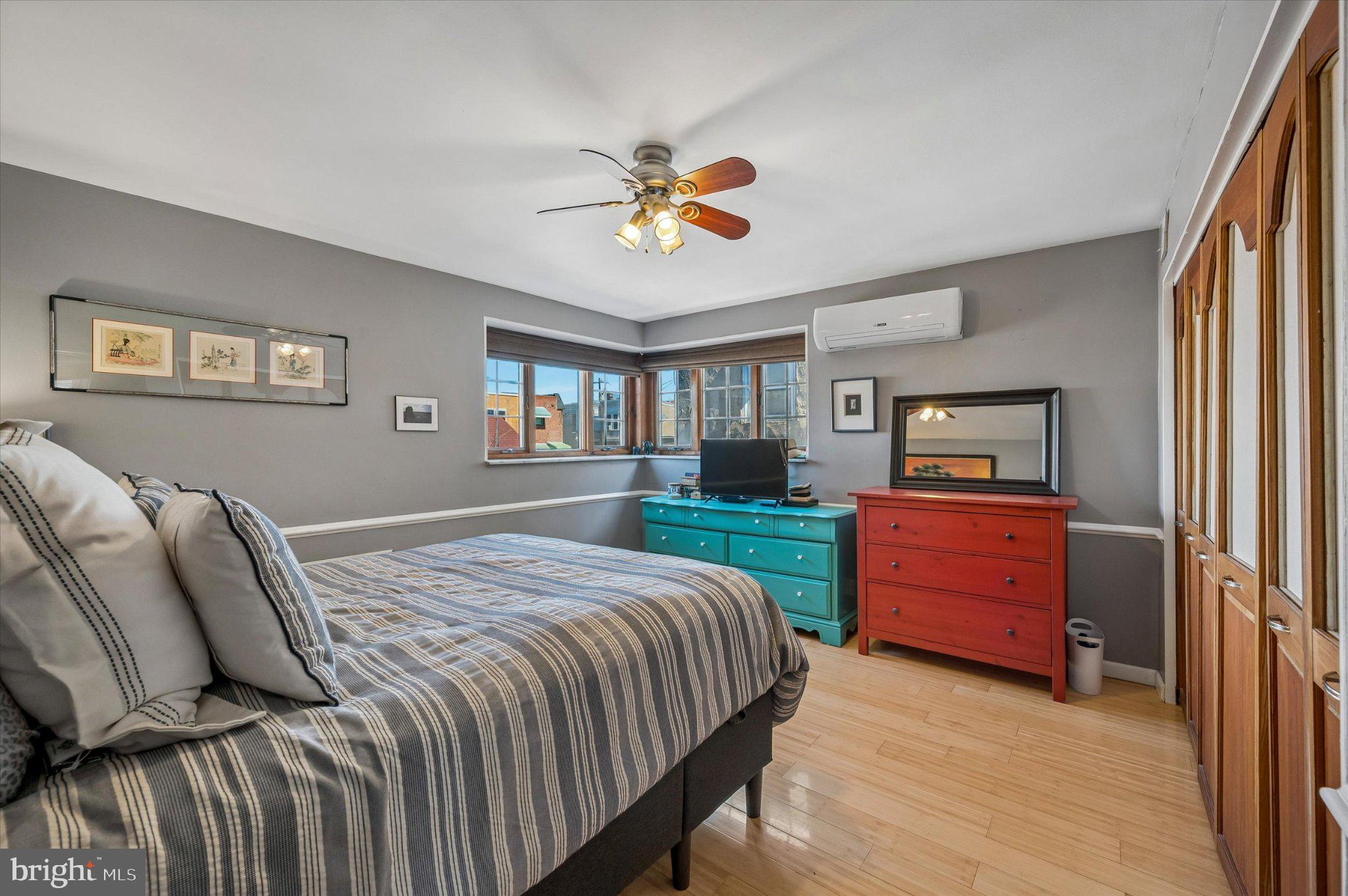 2834 Edgemont Street Philadelphia, PA 19134 - Photo 3 of 37 a bedroom with a bed and a dresser in it