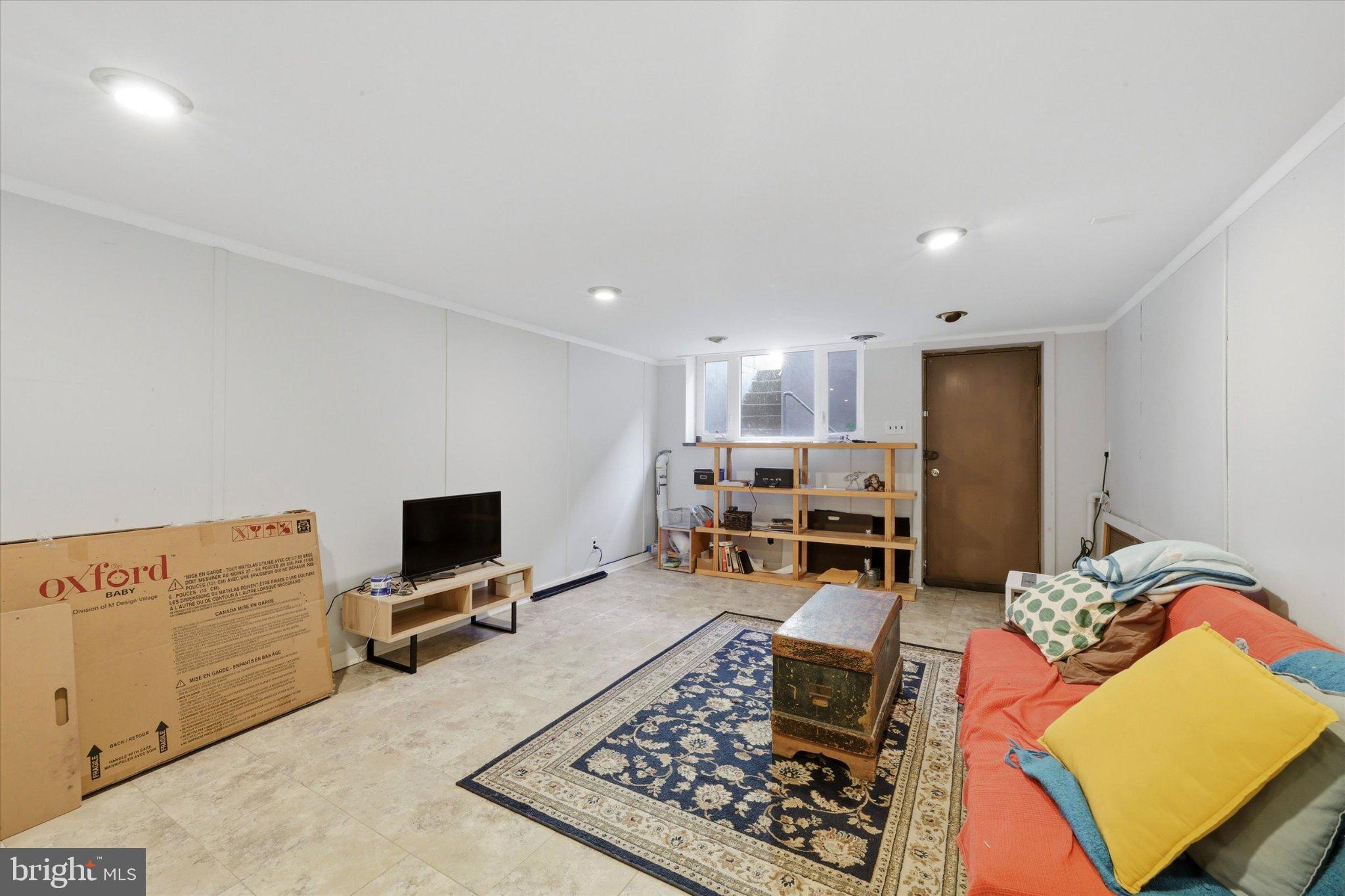 2834 Edgemont Street Philadelphia, PA 19134 - Photo 33 of 37 a bed room with a bed and furniture