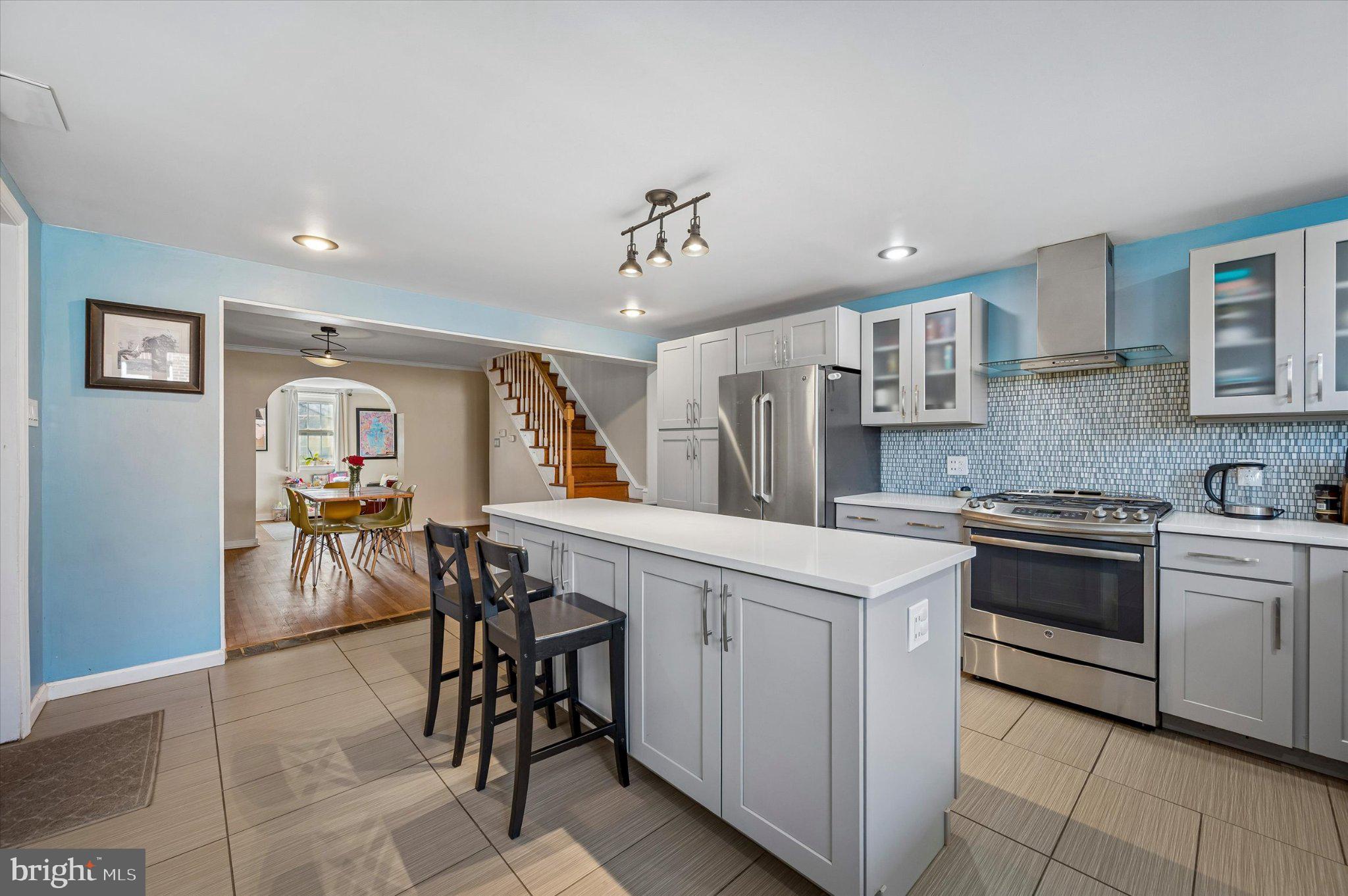 2834 Edgemont Street Philadelphia, PA 19134 - Photo 7 of 37 a kitchen with a table and chairs in it