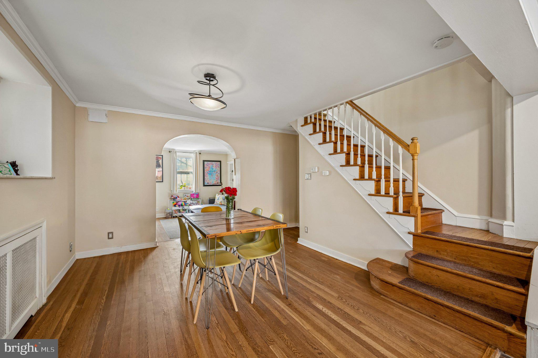 2834 Edgemont Street Philadelphia, PA 19134 - Photo 7 of 37 a view of a dining room with furniture wooden floor and windows