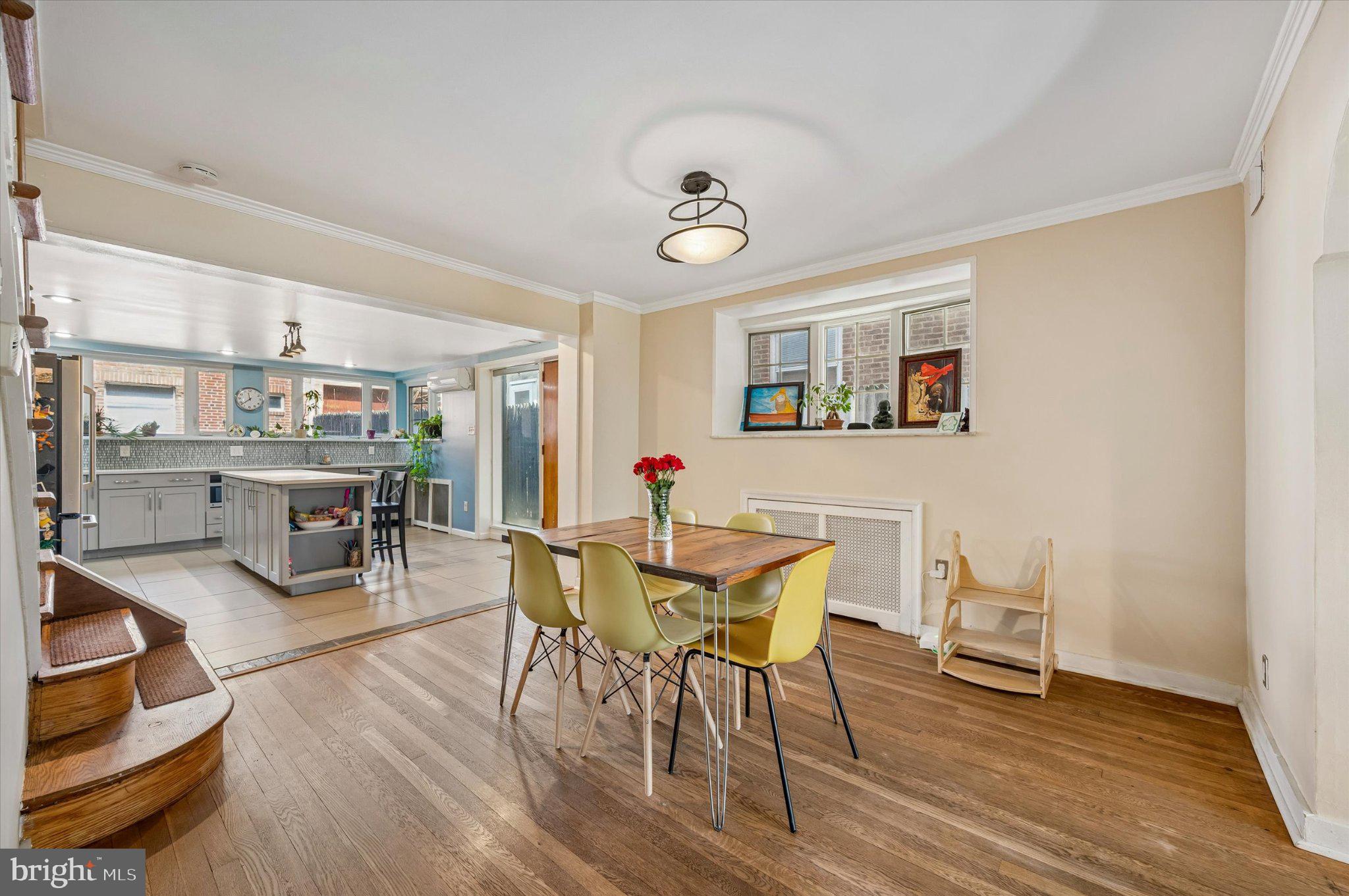 2834 Edgemont Street Philadelphia, PA 19134 - Photo 8 of 37 a view of a dining room with furniture and wooden floor