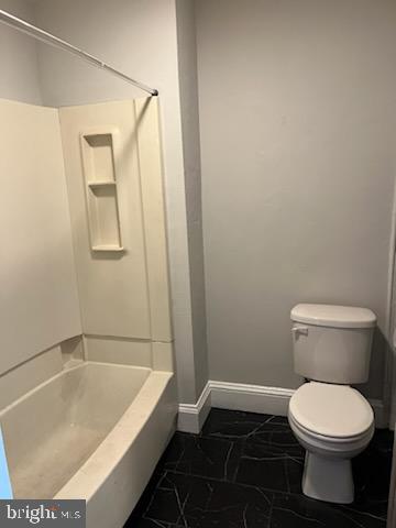 311 Elm Street, Unit 1 Reading, PA 19601 - Photo 19 of 20 a bathroom with a toilet and bathtub