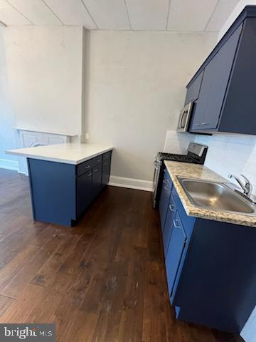 311 Elm Street, Unit 1 Reading, PA 19601 - Photo 8 of 20 a kitchen with sink cabinets and stove