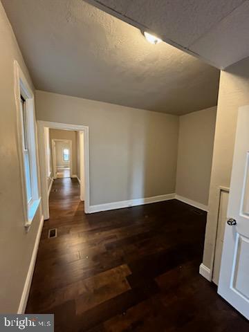 311 Elm Street, Unit 1 Reading, PA 19601 - Photo 10 of 20 wooden floor in an empty room with a window