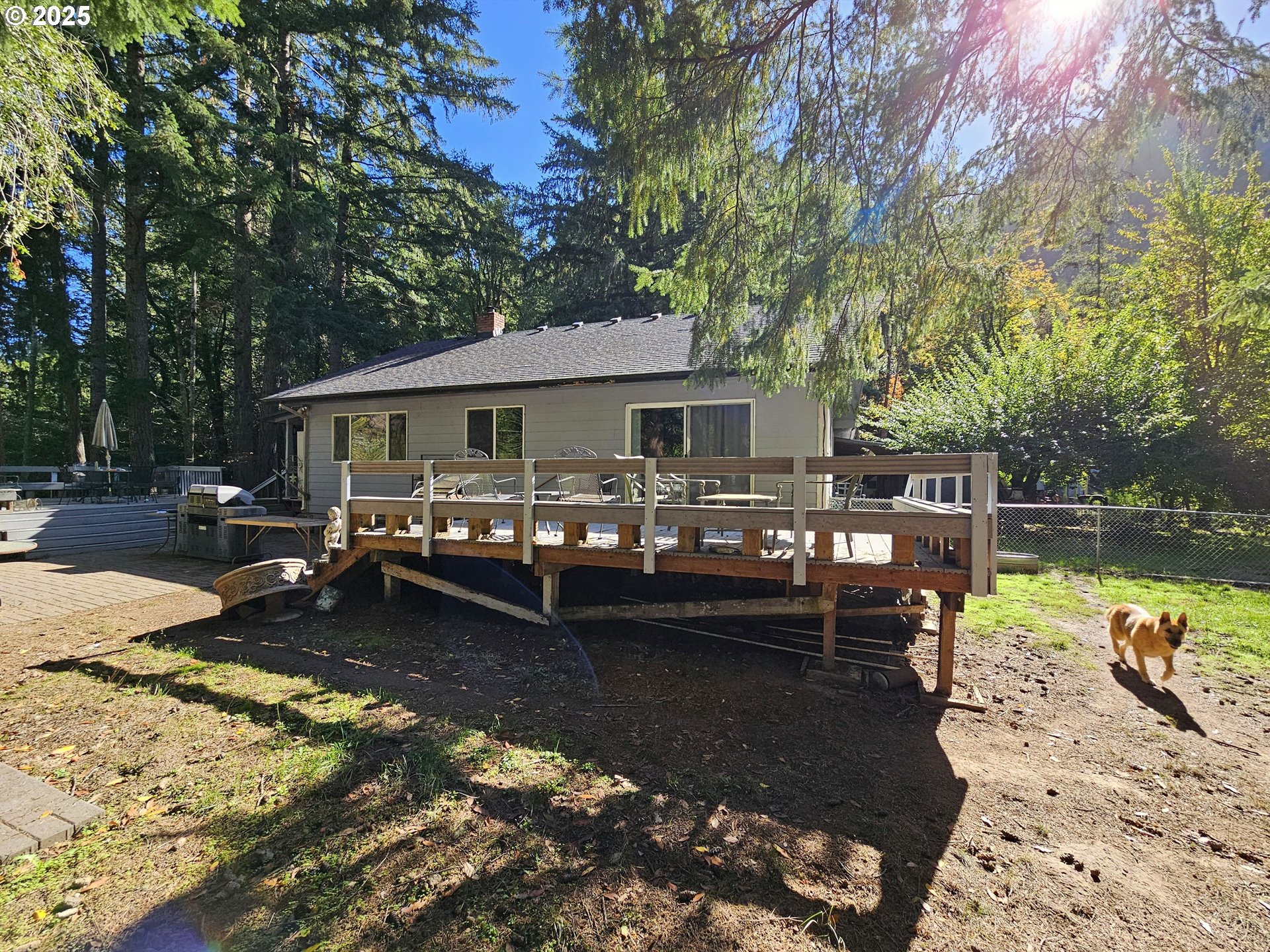 3463 Briarwood Road Umpqua, OR 97486 - Photo 15 of 29 a front view of a house with swimming pool and sitting area
