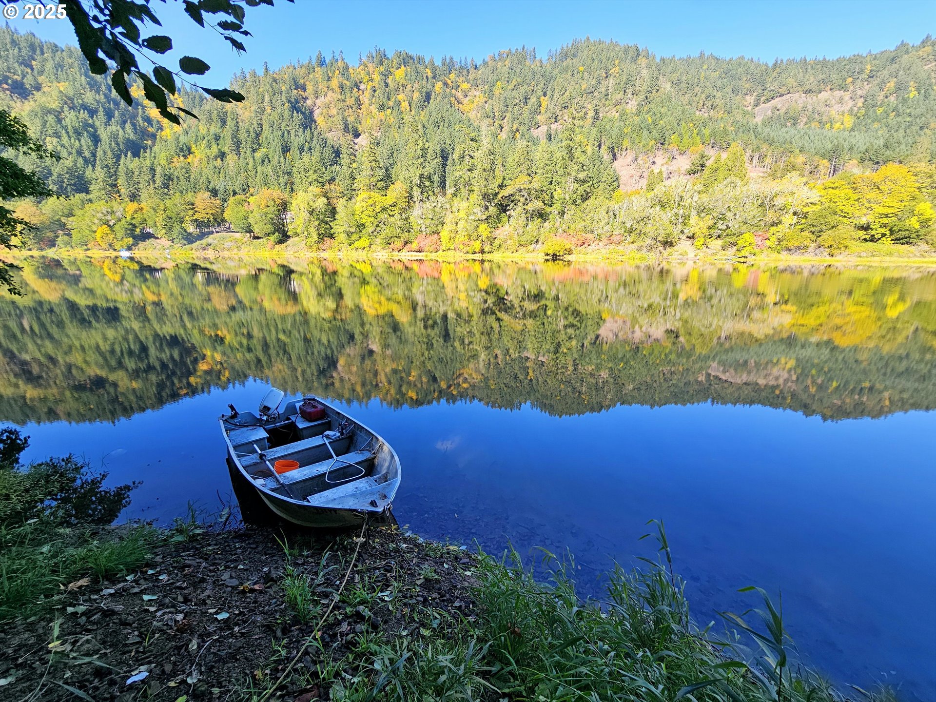 3463 Briarwood Road Umpqua, OR 97486 - Photo 20 of 29 a view of a lake with a yard