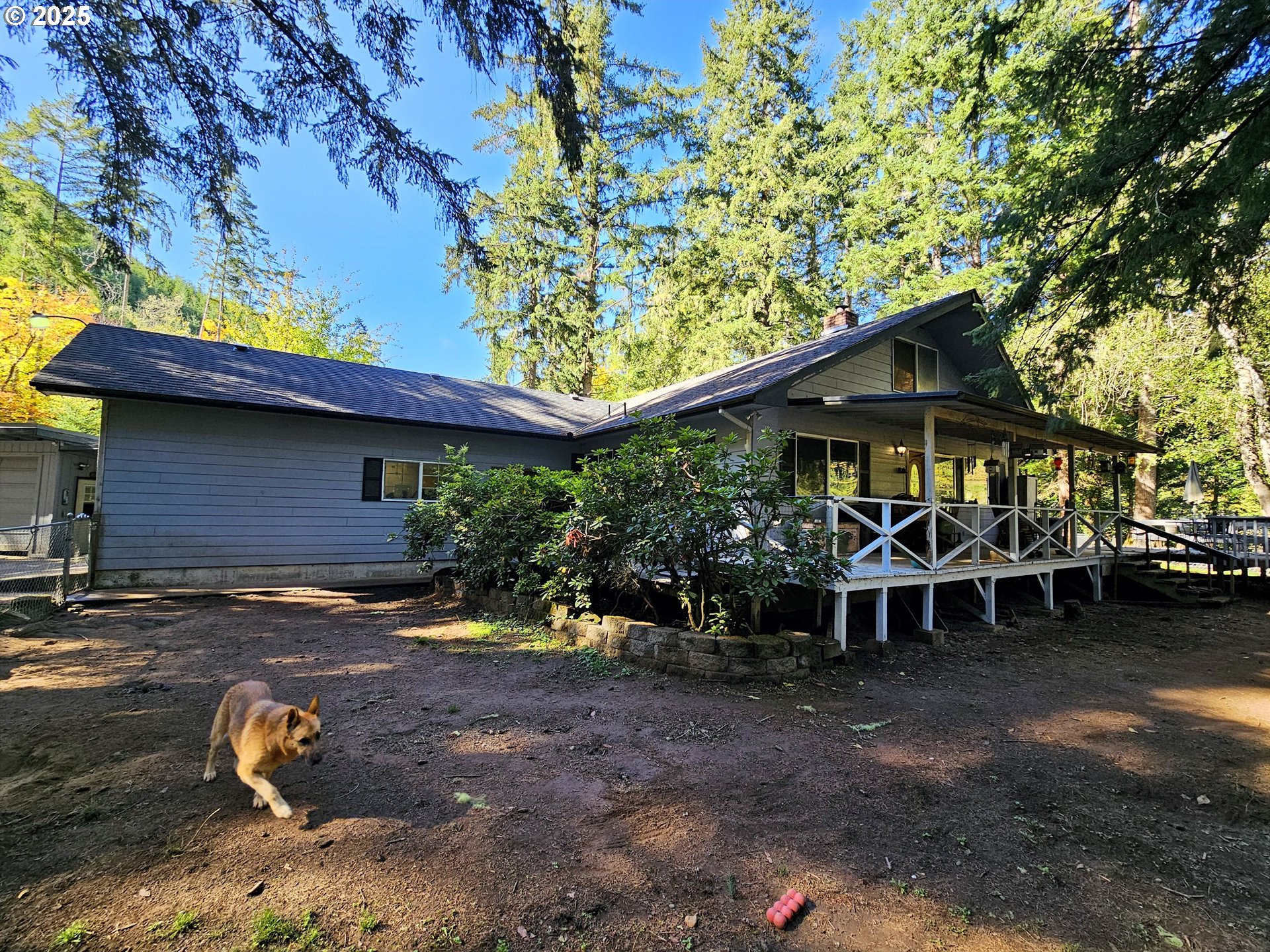 3463 Briarwood Road Umpqua, OR 97486 - Photo 21 of 29 a view of a wooden house with a yard